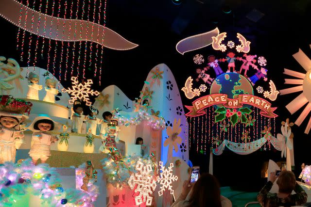 <p>Allen J. Schaben/Los Angeles Times via Getty </p> Guests inside the 'It's a Small World' ride at Disneyland in 2015
