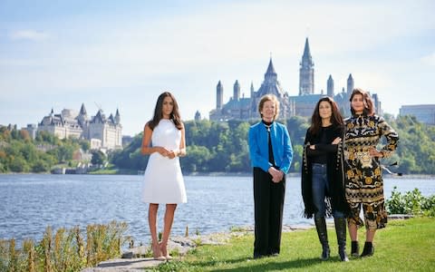 Saudi women's rights activist Loujain al-Hathloul (far right) poses with Meghan Markle in the April issue of Vanity Fair along with global leaders who attended the One Young World Summit in Ottawa in October 2016. - Credit: Jason Schmidt