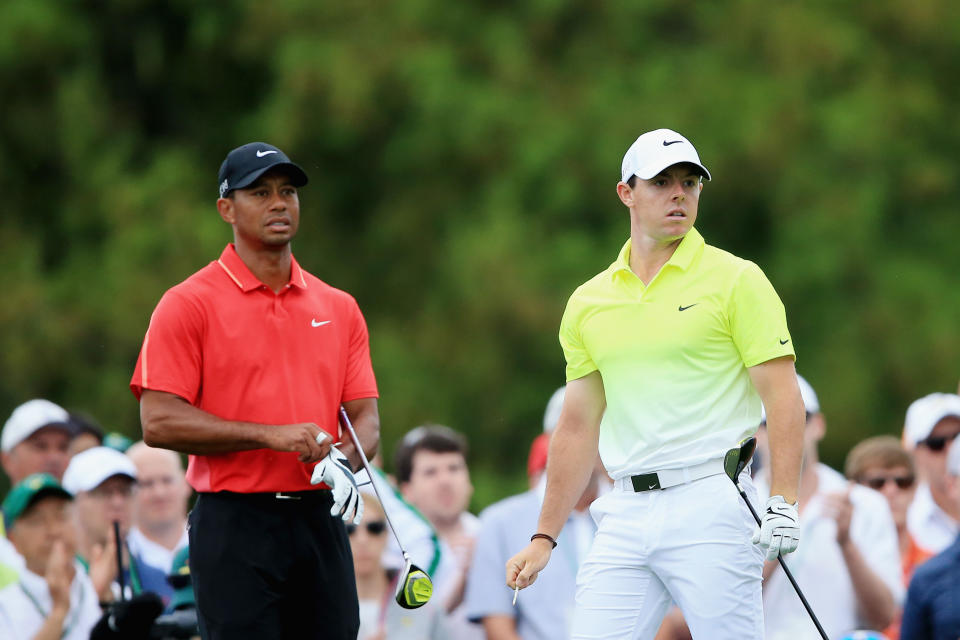 AUGUSTA, GA - APRIL 12: Tiger Woods of the United States and Rory McIlroy of Northern Ireland wait on the tenth tee during the final round of the 2015 Masters Tournament at Augusta National Golf Club on April 12, 2015 in Augusta, Georgia. (Photo by David Cannon/Getty Images)