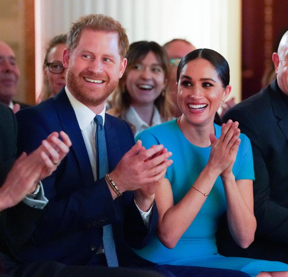 Britain's Prince Harry and his wife Meghan, Duchess of Sussex, cheer during the annual Endeavour Fund Awards at Mansion House in London, Britain March 5, 2020. Paul Edwards/Pool via REUTERS