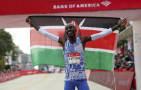 Kelvin Kiptum of Kenya celebrates his Chicago Marathon world record victory in Chicago's Grant Park on Sunday, Oct. 8, 2023. (Eileen T. Meslar /Chicago Tribune via AP)