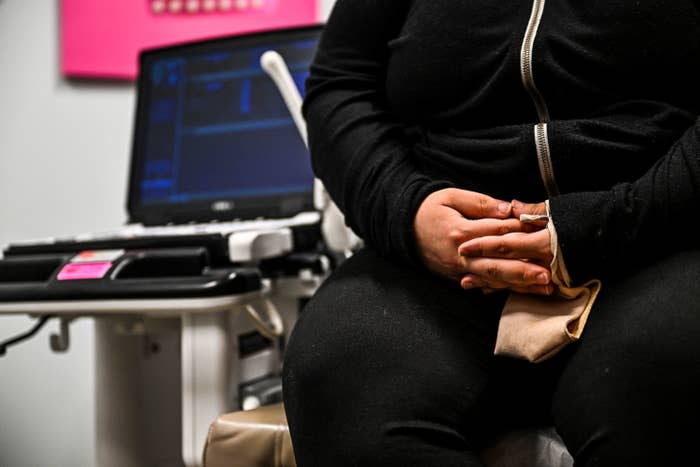 A woman sits in an examination room as she waits to receive an abortion at the Planned Parenthood Abortion Clinic in West Palm Beach, Florida, on July 14.