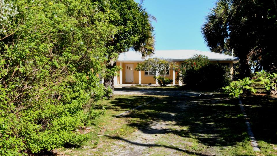 This Indialantic home, owned by a trust run by Rep. Thad Altman, is one of a handful at the center of an eminent domain suit filed by Brevard County. The county seeks an easement along the private beach behind the home for its "Mid Reach" beach renourishment project.
