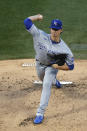 Kansas City Royals starting pitcher Brady Singer delivers during the first inning of a baseball game against the Chicago Cubs Tuesday, Aug. 4, 2020, in Chicago. (AP Photo/Charles Rex Arbogast)