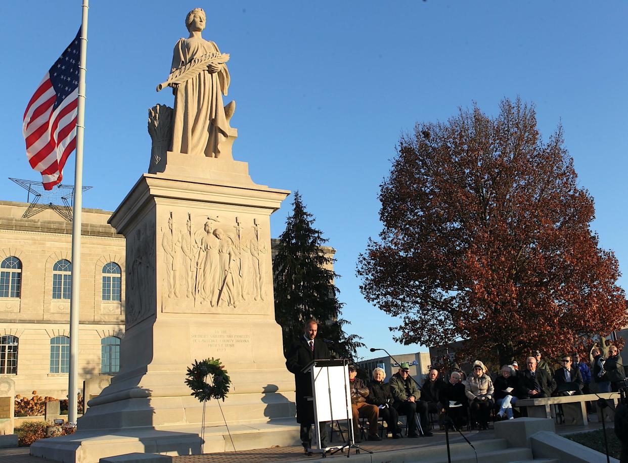 Lawrence County Circuit Court Judge Nathan Nikirk addresses the crowd during the celebration of the 100th Anniversary of the placement of the Miss Indiana Statue atop the Lawrence County Soldiers, Sailors, and Pioneers Monument Monday, Nov. 27, 2023.