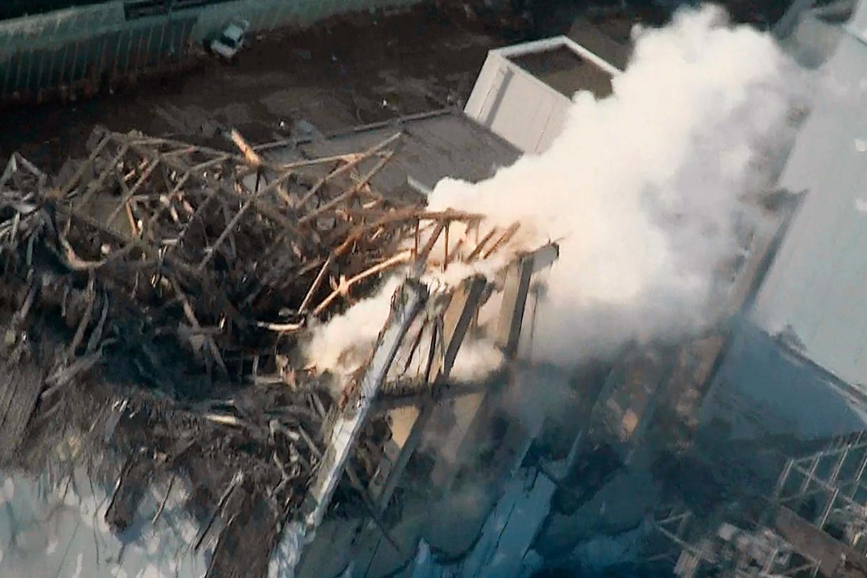 Smoke billows from wrecked unit 3 at Fukushima Dai-ichi nuclear power plant in Okuma town (File Photo): AP