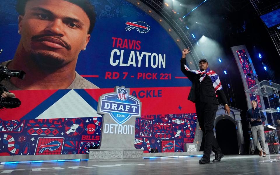 Travis Clayton walks on stage after being picked by the Buffalo Bills