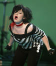Kelly Osbourne performs "Shut Up" during the 30th annual American Music Awards in Los Angeles January 13, 2003. In addition to performing, Kelly also hosted the show with the rest of her family. Pictures of the month January 2003 REUTERS/Adrees Latif FG/SN