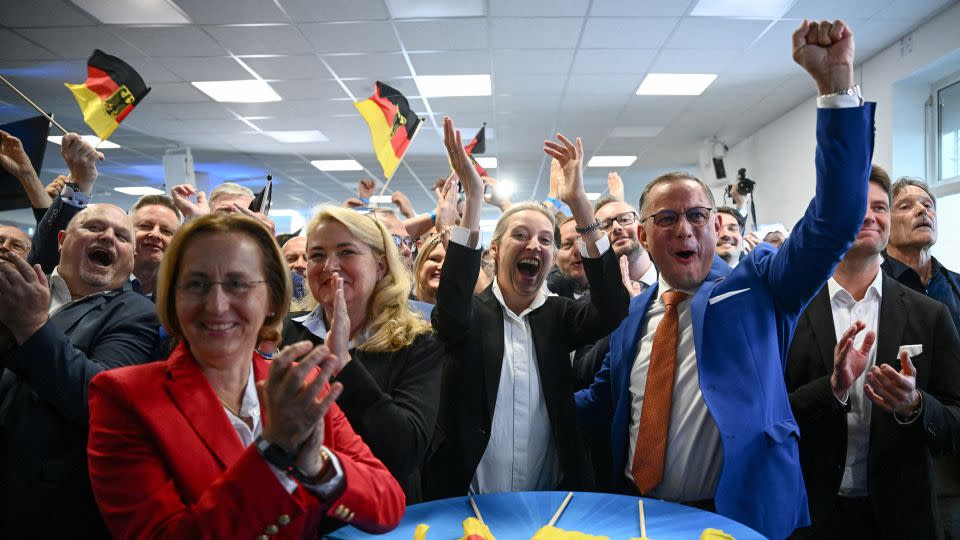 Alternative for Germany (AfD) party co-leaders Alice Weidel and Tino Chrupalla cheer the exit poll in Berlin, Germany, June 9, 2024. - Annegret Hilse/Reuters