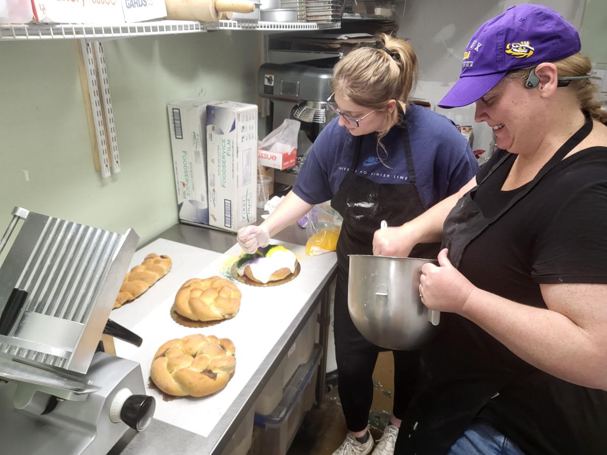 Bakers Andrea Estay and Kacey Mock add frosting and sugar to king cakes Tuesday, Jan. 31, 2023 at The Willow Cafe in Thibodaux.