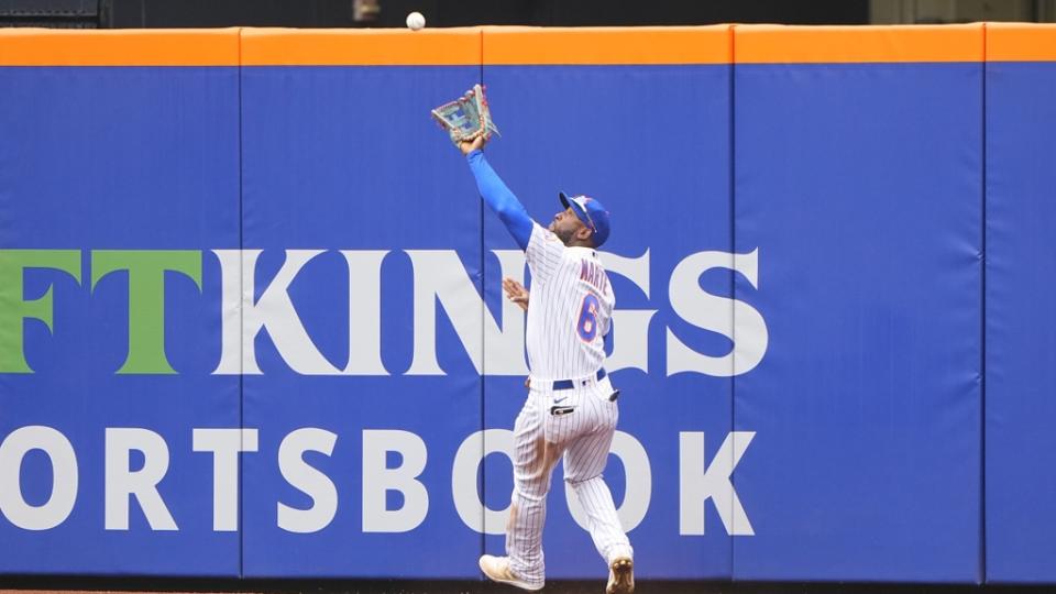 May 4, 2022;  New York City, New York, USA;  New York Mets right fielder Starling Marte (6) catches a fly ball hit by Atlanta Braves shortstop Dansby Swanson (7) (not pictured) during the fifth inning at Citi Field.