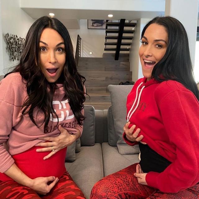 Nikki and Brie Bella flaunt their growing baby bumps at WWD Magic Las Vegas