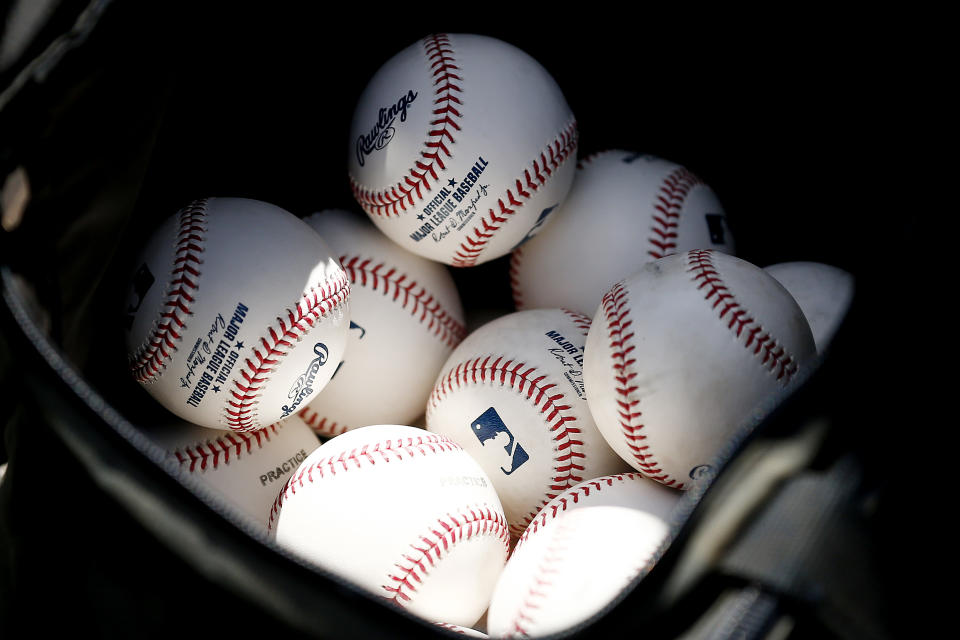 VARIOUS CITIES,  - MARCH 12:  A detail of baseballs during a Grapefruit League spring training game between the Washington Nationals and the New York Yankees at FITTEAM Ballpark of The Palm Beaches on March 12, 2020 in West Palm Beach, Florida. Many professional and college sports, including the MLB, are canceling or postponing their games due to the ongoing threat of the Coronavirus (COVID-19) outbreak. (Photo by Michael Reaves/Getty Images)