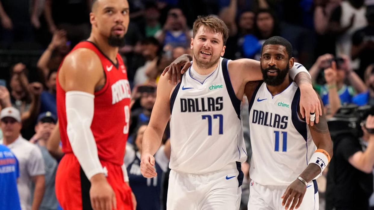 <div>DALLAS, TEXAS - APRIL 07: Luka Doncic #77 and Kyrie Irving #11 of the Dallas Mavericks embrace after defeating the against the Houston Rockets in overtime at American Airlines Center on April 07, 2024 in Dallas, Texas. NOTE TO USER: User expressly acknowledges and agrees that, by downloading and or using this photograph, User is consenting to the terms and conditions of the Getty Images License Agreement. (Photo by Sam Hodde/Getty Images)</div>