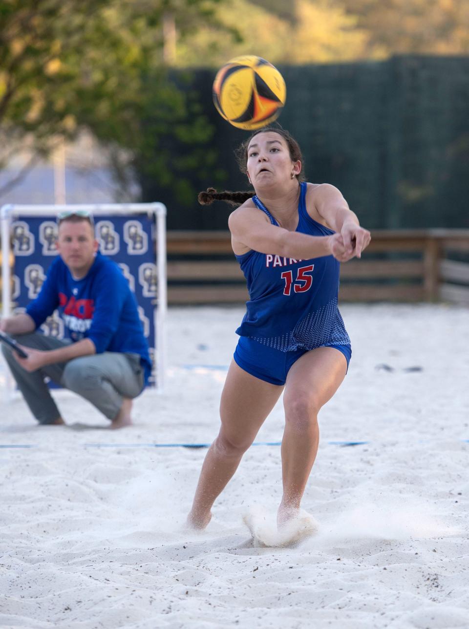 Pace's Cambree Klien (No. 15) digs Gulf Breeze serve during beach volleyball action at the Gulf Breeze Community Center on Friday, April 5, 2024.