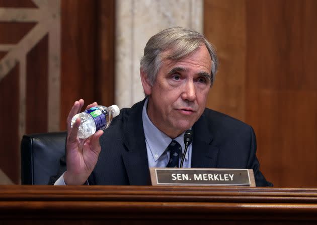 Sen. Jeff Merkley (D-Ore.) holds a plastic bottle as he talks about recycling during a Senate Appropriations Committee subcommittee hearing on June 9, 2021. (Photo: Kevin Dietsch via Getty Images)