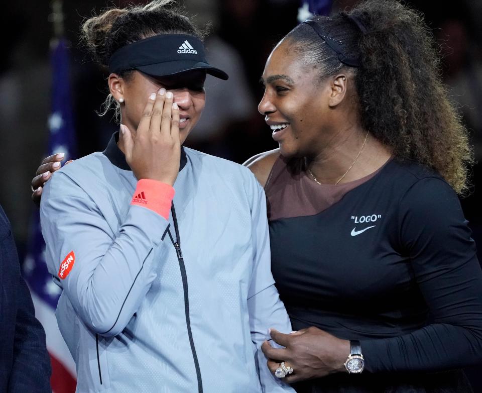 Naomi Osaka (left) cries after defeating Serena Williams for the 2018 US Open title.