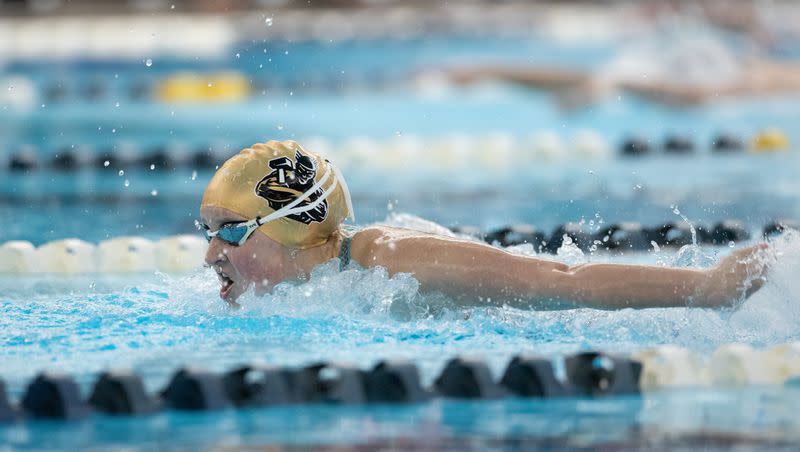 Desert Hill’s Chesney Bonner, shown here at last year’s 4A state swim meet, had the top qualifying time in the 100-yard butterfly during Friday’s preliminaries at the Stephen L. Richards Building in Provo.