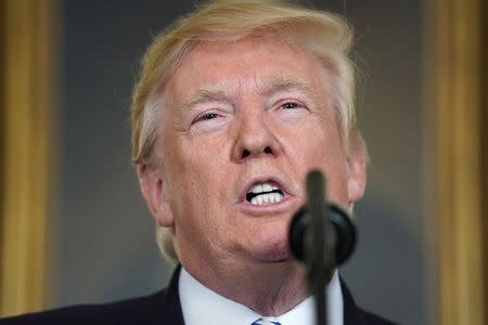 U.S. President Donald Trump speaks about his recent trip to Asia in the Diplomatic Room of the White House in Washington, U.S., November 15, 2017. REUTERS/Joshua Roberts