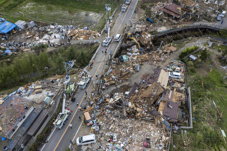 Buildings lie in ruins after they were hit by a tornado shortly before the arrival of Typhoon Hagibis, on Oct. 13, 2019, in Chiba, Japan. (Photo: Carl Court/Getty Images)