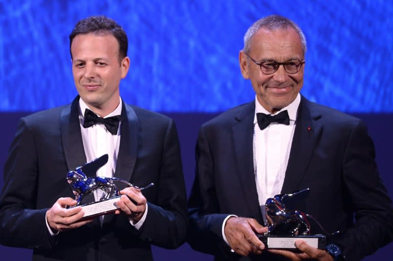 Director Amat Escalante (L) and director Andrei Konchalovsky both receive the Silver Lion award for Best Director respectively for their movies "The Untamed" and "Paradise" during the awards ceremony of the 73rd Venice Film Festival