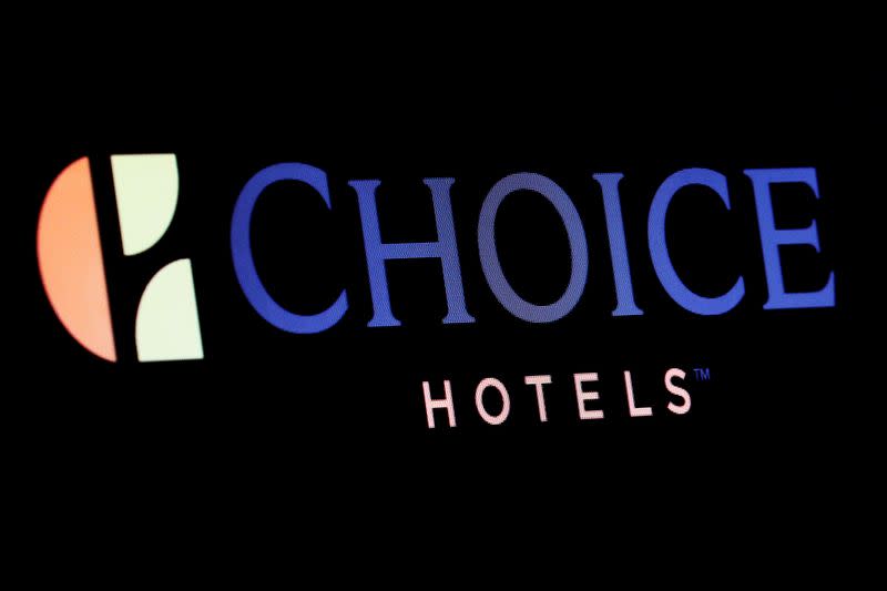 The company logo for Choice Hotels is displayed on a screen on the floor of the NYSE