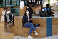 A passenger wearing a protective face mask waits for the departure of his train at the "Gare de Lyon" railway station as France is slowly reopening after almost two months of strict lockdown throughout the country due to the epidemic of coronavirus (COVID 19) on May 13, 2020 in Paris, France. France has begun a gradual easing of its lockdown measures and restrictions amid the coronavirus (COVID-19) outbreak. The Coronavirus (COVID-19) pandemic has spread to many countries across the world, claiming over 292,000 lives and infecting over 4.2 million people.