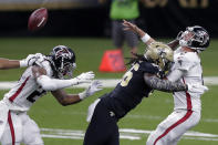 Atlanta Falcons quarterback Matt Ryan (2) is hit by New Orleans Saints outside linebacker Demario Davis (56) in the first half of an NFL football game in New Orleans, Sunday, Nov. 22, 2020. (AP Photo/Brett Duke)