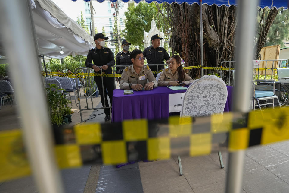 Thai officer waiting potential candidates to become members of Thailand's next Senate arrive at the Phaya Thai district office in Bangkok on Monday, May 20, 2024. Thailand on Monday officially kicked off the task of selecting a new set of Senators, a process that has become part of the ongoing war between progressive forces hoping for democratic political reforms and conservatives seeking to keep the status quo. (AP Photo/Sakchai Lalit)