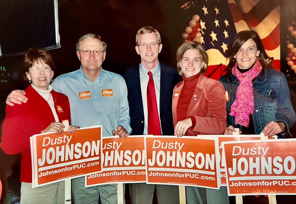 Dusty Johnson poses with wife Jacquelyn (second from right) and her family after being elected Public Utilities Commissioner at age 28 in 2004. He defeated Democratic incumbent Jim Burg.