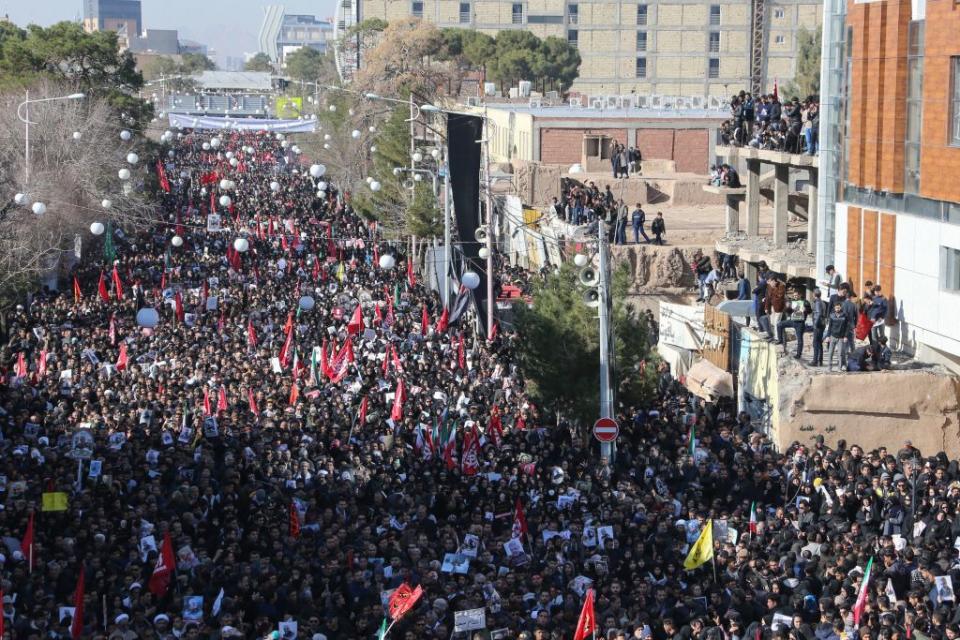 Iranian mourners gather during the final stage of funeral processions for slain top general Qasem Soleimani on Tuesday. Source: Getty