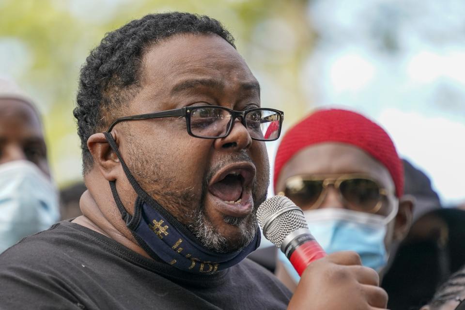 Jacob Blake's father, Jacob Blake Sr. talks to a crowd at a rally Saturday, Aug. 29, 2020, in Kenosha, Wis. (AP Photo/Morry Gash)