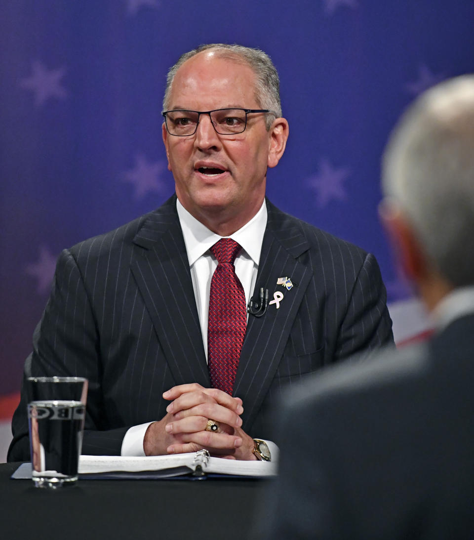 Democratic Louisiana Gov. John Bel Edwards speaks on set before the start of the Louisiana Governor's runoff debate, Wednesday, Oct. 30, 2019, at Louisiana Public Broadcasting in Baton Rouge, La. (Hilary Scheinuk/The Advocate via AP)