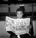 Cassius Clay (later Muhammad Ali) reads the newspapers in London, Britain June 19, 1963, the day after his World Title Fight win against Henry Cooper. Mandatory Credit: Action Images / MSI/File Photo