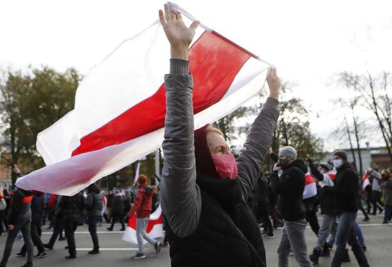 Belarusian opposition supporters hold a rally in Minsk