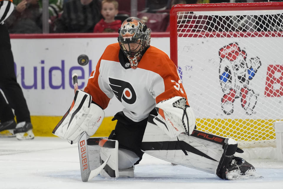 Philadelphia Flyers goaltender Samuel Ersson makes a save against the Chicago Blackhawks during the second period of an NHL hockey game Wednesday, Feb. 21, 2024, in Chicago. (AP Photo/Erin Hooley)