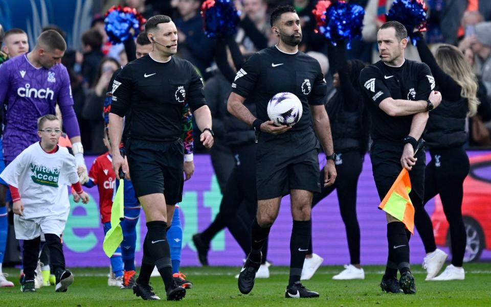 Sunny Singh Gill with his assistant referees before the match between Crystal Palace and Luton/History-making South Asian referee blasted by Mike Dean for signing autographs at Crystal Palace