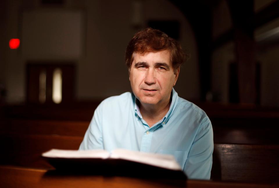 Pastor Mike Brown of Franklin Church poses for a photo inside the church in New Albany on May 26, 2021. Brown, an evangelical pastor, got his vaccine but hasn't addressed it from the pulpit other than in prayer.