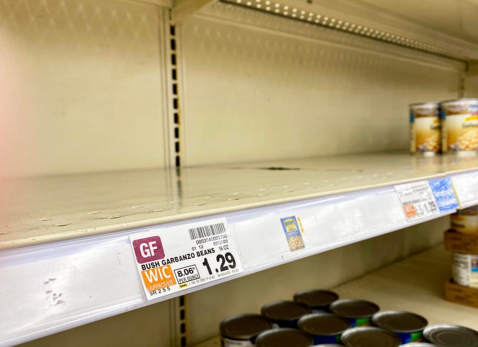 In this file photo, the "WIC" label on the shelf indicates the cans of beans that usually sit here are an allowable purchase under the federal Women, Infants and Children food assistance program.