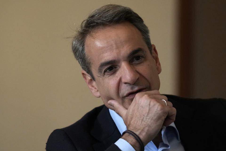 Greece's Prime Minister and New Democracy leader Kyriakos Mitsotakis speaks, during an interview with The Associated Press, in Volos, central Greece, Thursday, May 11, 2023. (AP Photo/Thanassis Stavrakis)