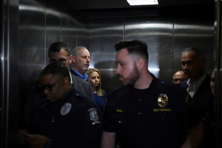 Amber Guyger, who is charged in the killing of Botham Jean in his own home, arrives on the first day of the trial in Dallas