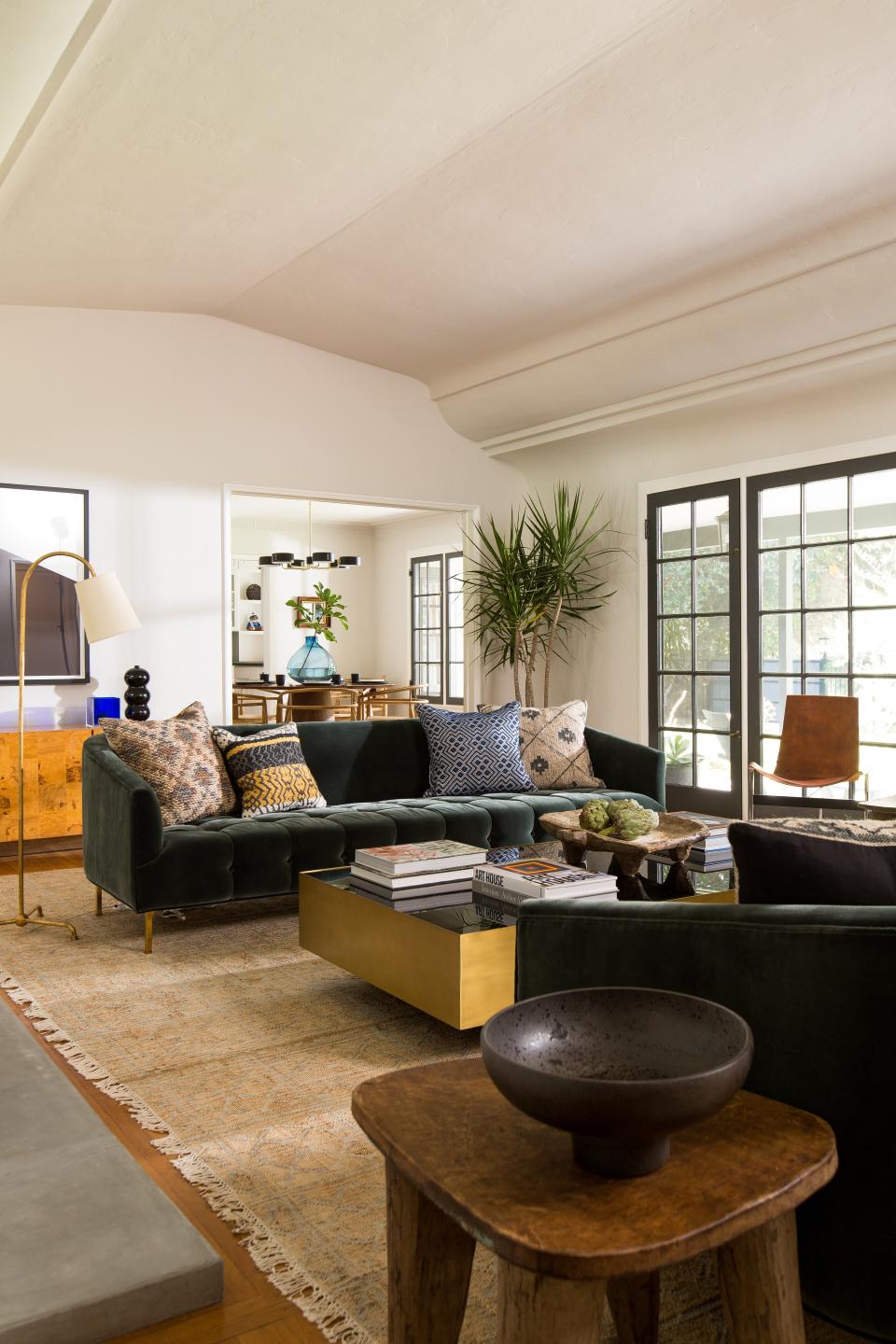 “They described their style as ‘artsy, but not in the macaroni-and-yarn kind of way.’ I immediately knew there had to be an eclectic mix of furnishings that would reflect their upbeat and effervescent personalities,” says designer James Tabb. He mixed textures, colors, and materials to achieve the look.