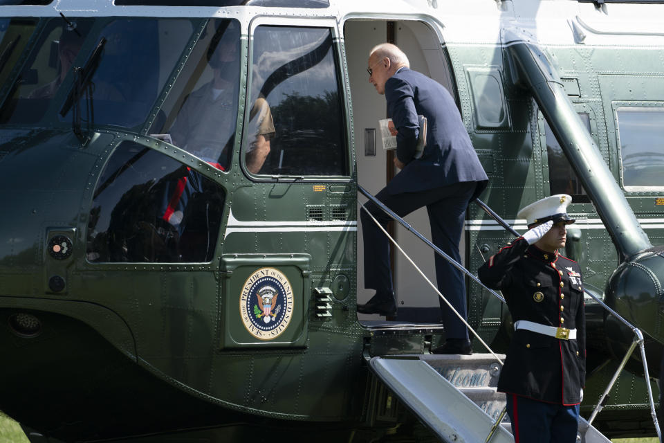 President Joe Biden boards Marine One on the Ellipse near the White House for a trip to Delaware, Wednesday, June 2, 2021, in Washington. (AP Photo/Evan Vucci)