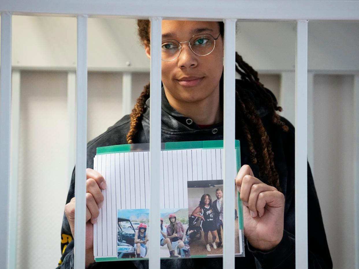 Brittney Griner in cage outside of Russian trial