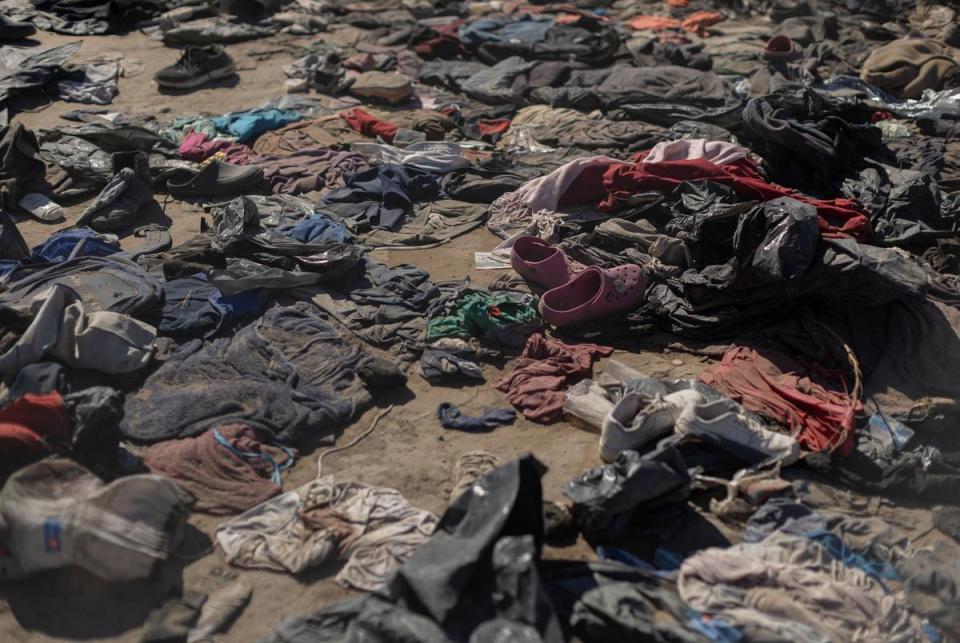 Clothes left behind by migrants at scattered by the bank of the Rio Grande in Eagle Pass, on Jan. 17, 2024. The U.S. Department of Justice, in a filing to the U.S. Supreme Court, stated that U.S. Border Patrol agents have been blocked off of a section of the border, accessible through Shelby Park.