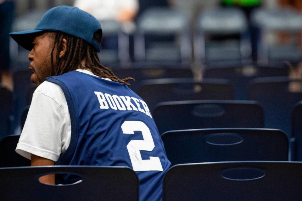 A member of the audience wears a Devin Booker jersey during a ceremony for the retirement of Booker’s high school jersey at Moss Point High School in Moss Point on Saturday, Dec. 10, 2022.