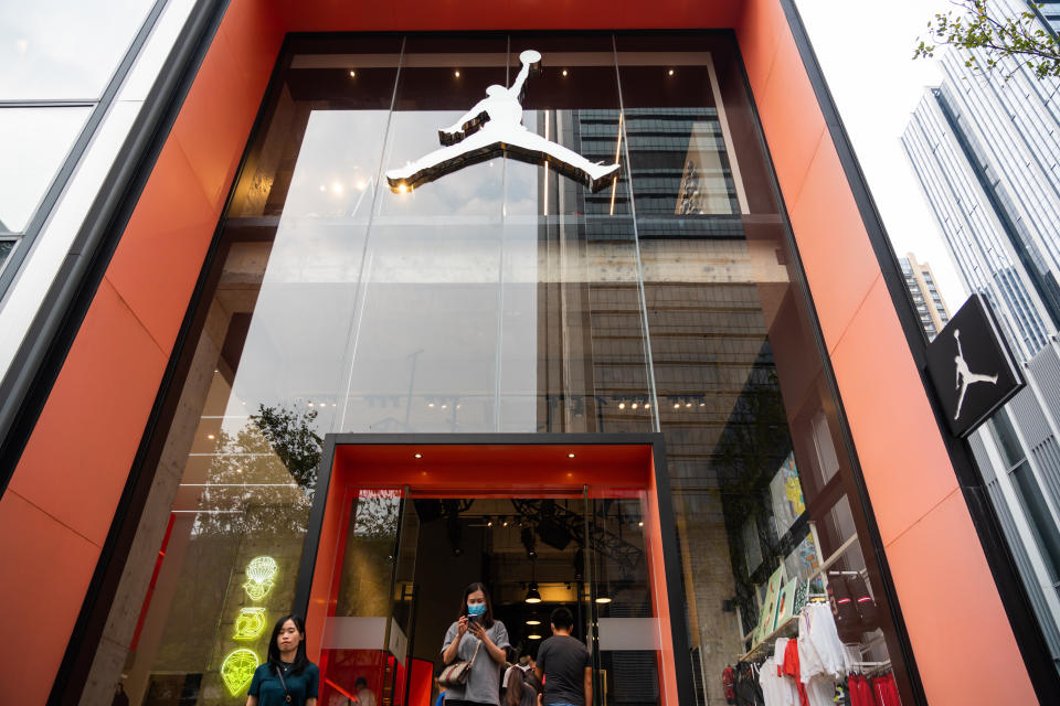 SHENZHEN, CHINA - 2020/10/04: Customers are seen at an Air Jordan store in Shenzhen. (Photo by Alex Tai/SOPA Images/LightRocket via Getty Images)