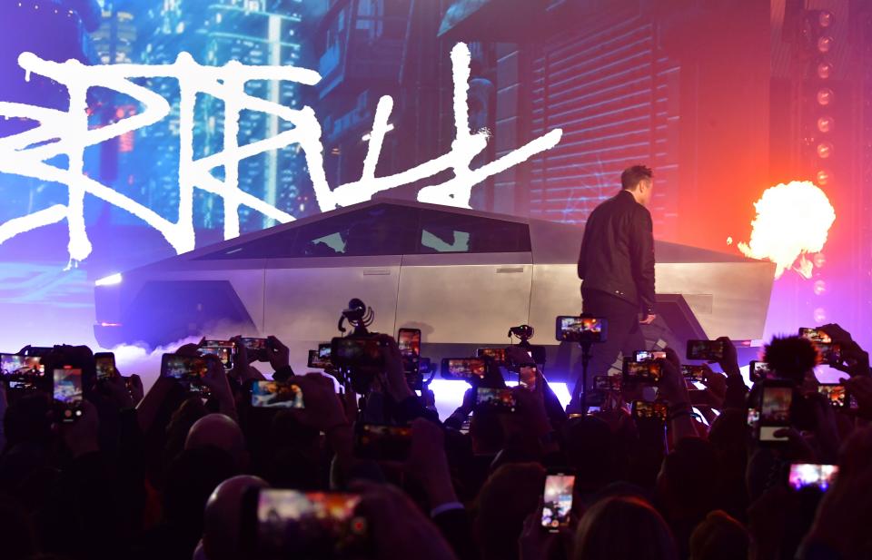 Tesla co-founder and CEO Elon Musk unveils the all-electric battery-powered Tesla's Cybertruck at Tesla Design Center in Hawthorne, California on November 21, 2019. (Photo by FREDERIC J. BROWN / AFP) (Photo by FREDERIC J. BROWN/AFP via Getty Images)