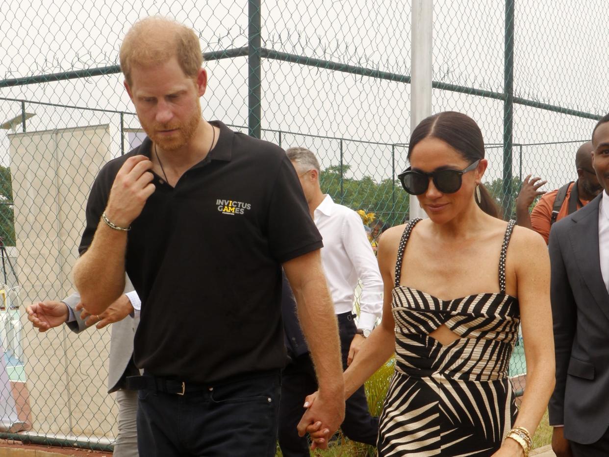 Prince Harry and Meghan Markle attend a volleyball match in Nigeria in May 2024.