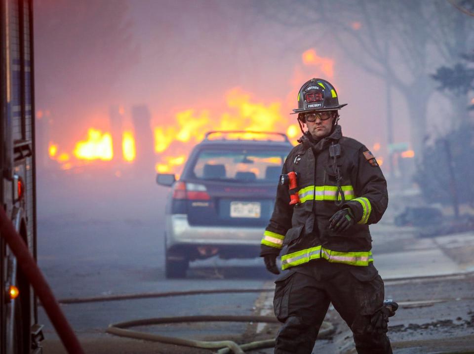 A firefighter on the scene in Boulder, Colorado.